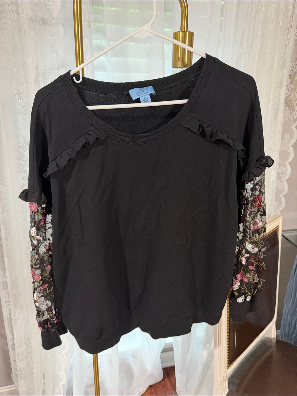 CeCe Black Sweatshirt with Floral Embroidered Sleeves